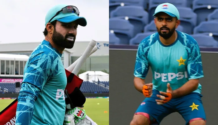 Members of the Pakistan cricket team practicing in their new T20 World Cup training kit in Dallas, interrupted by a sudden rain shower.